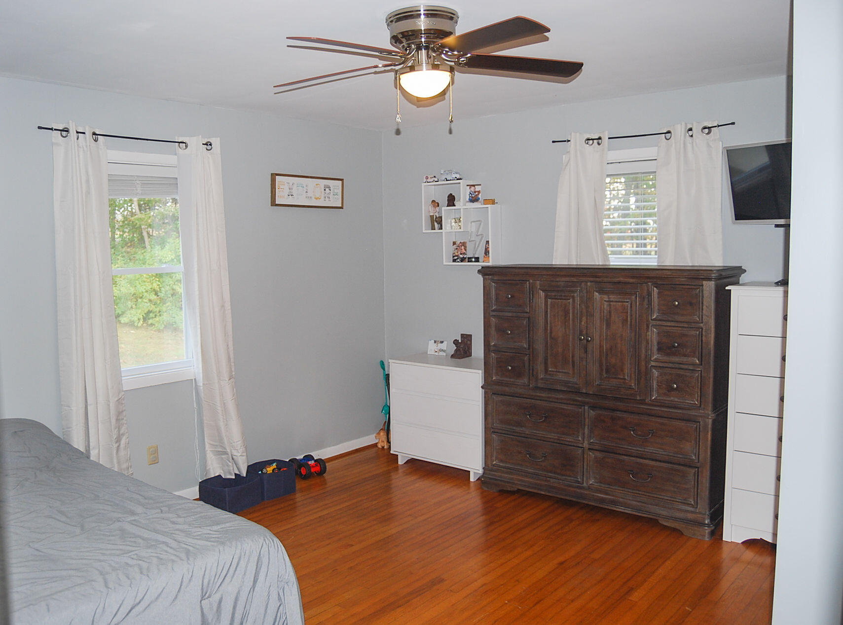 410 Mill Run Road Chatham, VA 24531 - Photo 15 of 34 a bedroom with a bed and wooden floor
