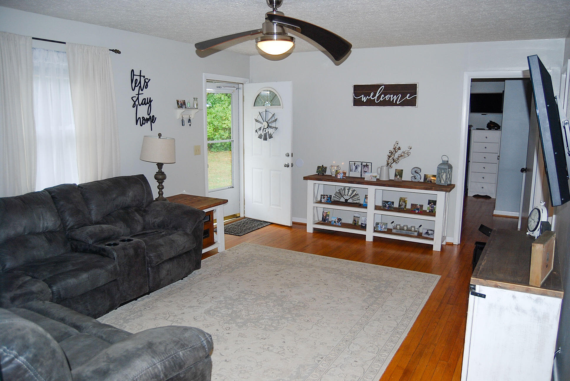 410 Mill Run Road Chatham, VA 24531 - Photo 20 of 34 a living room with furniture and a flat screen tv
