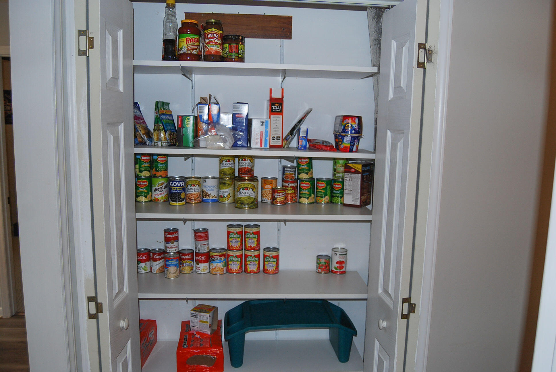 410 Mill Run Road Chatham, VA 24531 - Photo 28 of 34 a room with wine cabinets and a shelf with wooden floor
