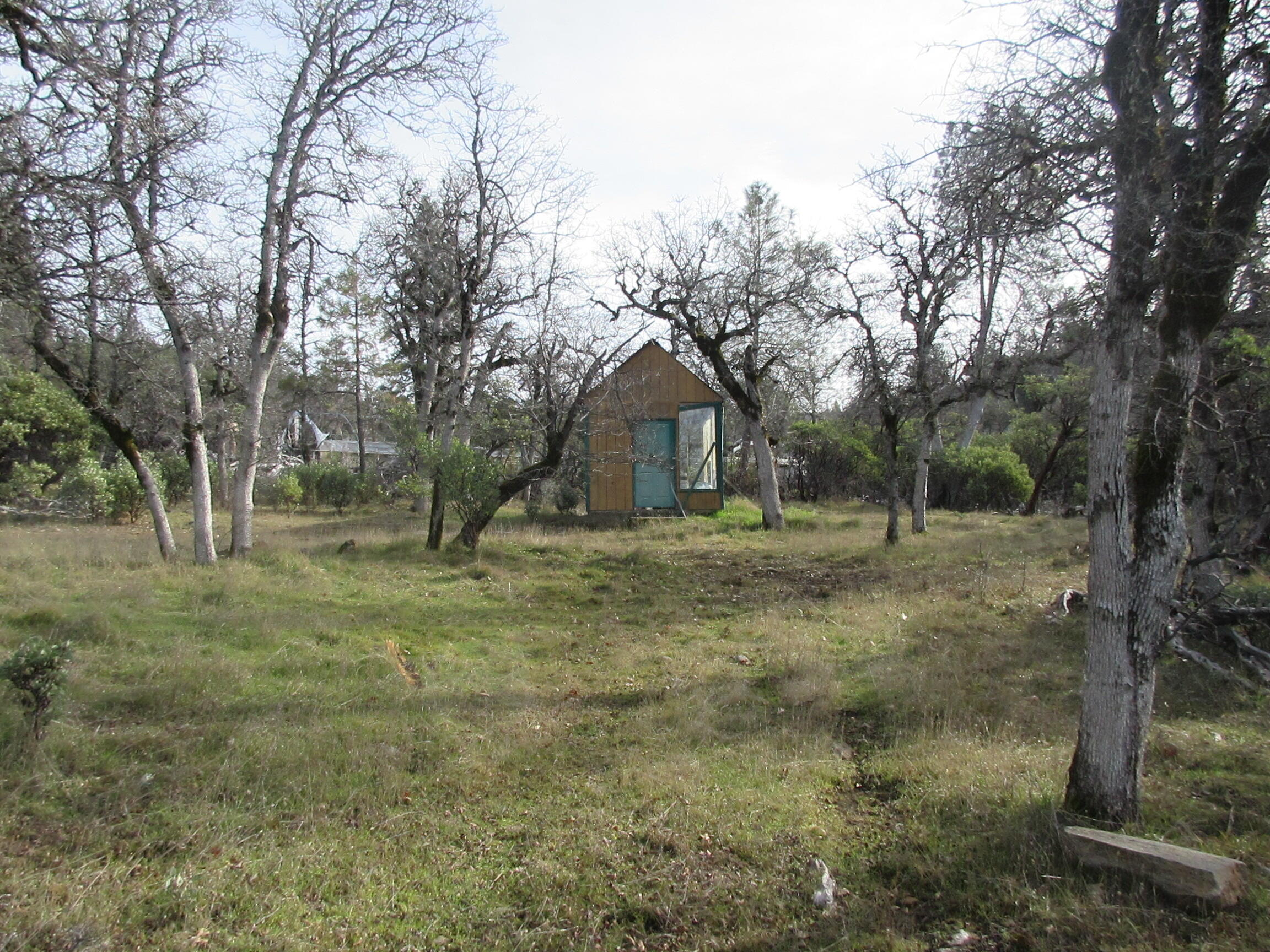 30425 Frontier Road Oak Run, CA 96069 - Photo 14 of 35 a view of a house with a yard
