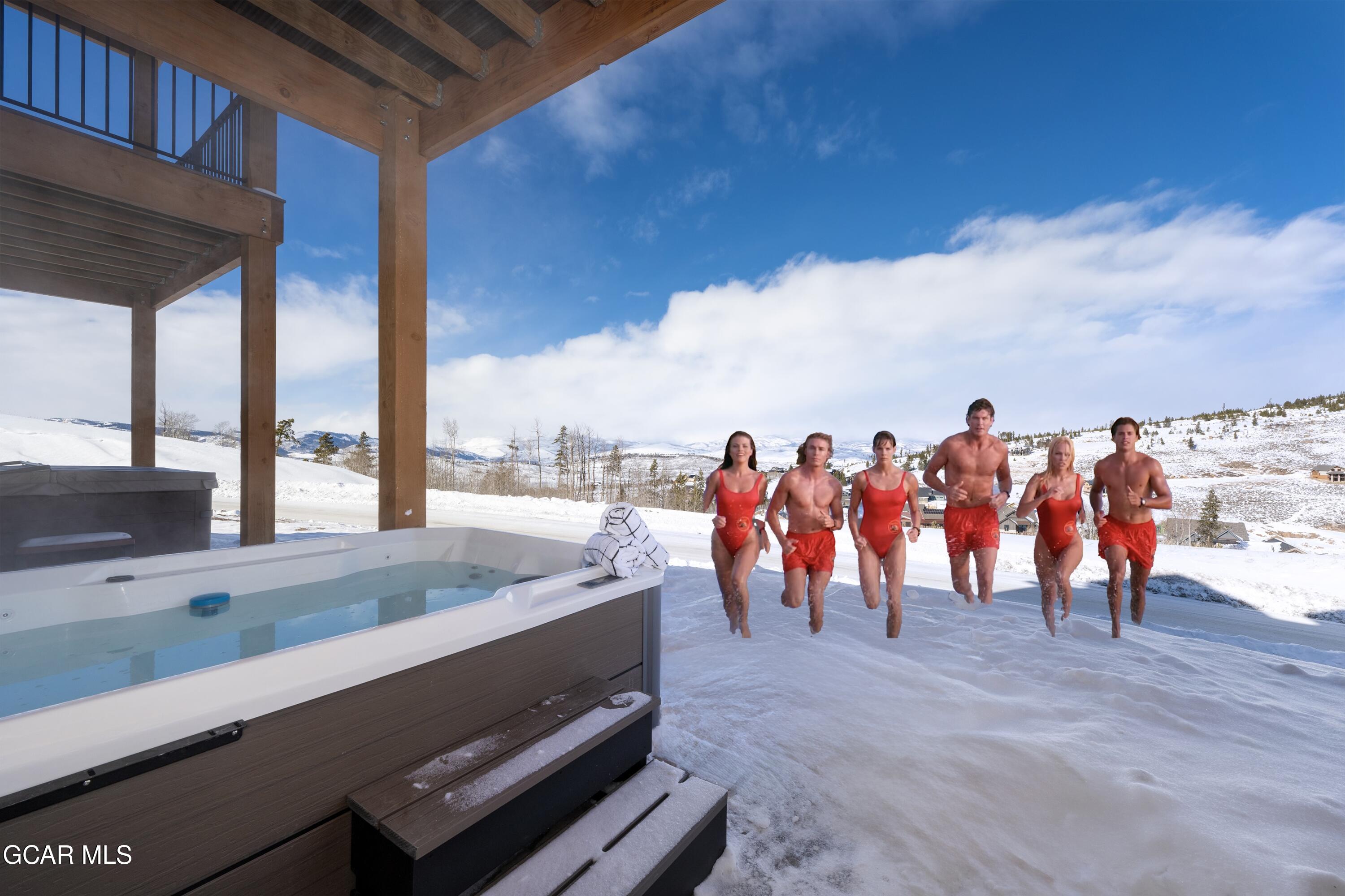 103 Saddle Mountain Camp Road Granby, CO 80446 - Photo 3 of 38 Lower Level Deck - Hot Tub 1