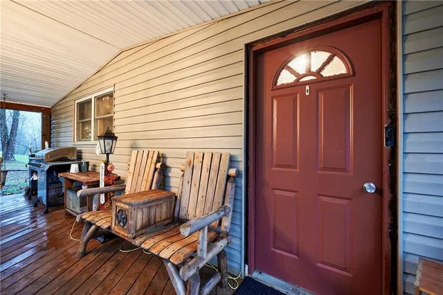 a kitchen with stainless steel appliances granite countertop a refrigerator a sink and a stove