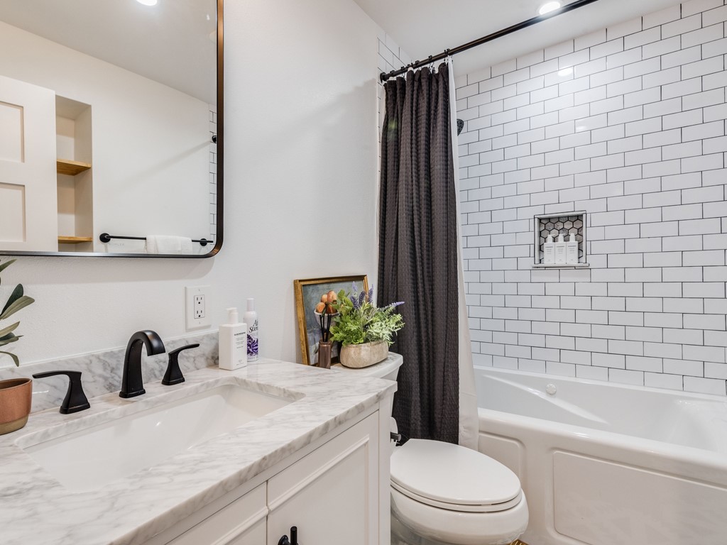 500 East Riverside Drive, Unit 206 Austin, TX 78704 - Photo 21 of 32 Full bath with vanity and shower / bath combo