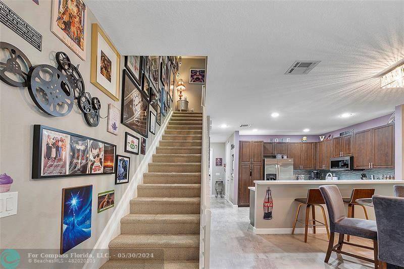 7774 Paddock Place, Unit 7774 Davie, FL 33328 - Photo 16 of 28 a view of a kitchen with furniture and a kitchen