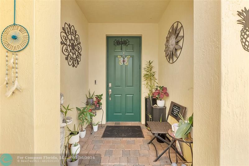 7774 Paddock Place, Unit 7774 Davie, FL 33328 - Photo 3 of 28 a view of a entryway with furniture and front door