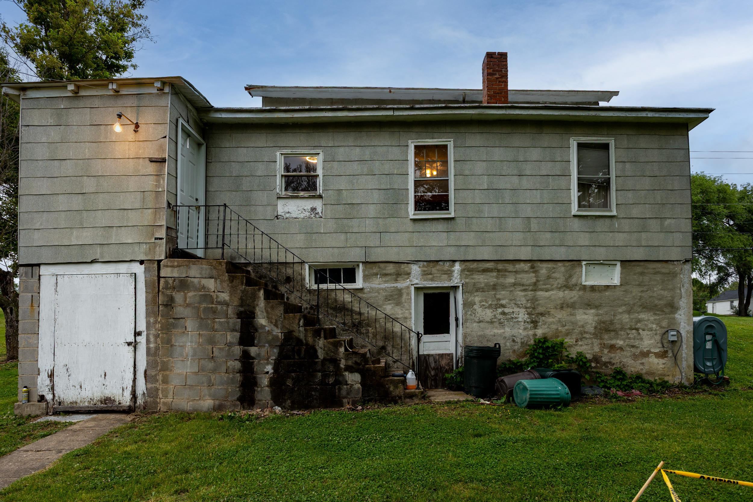 13896 Rockingham Pike Elkton, VA 22827 - Photo 57 of 60 a brick house with a yard