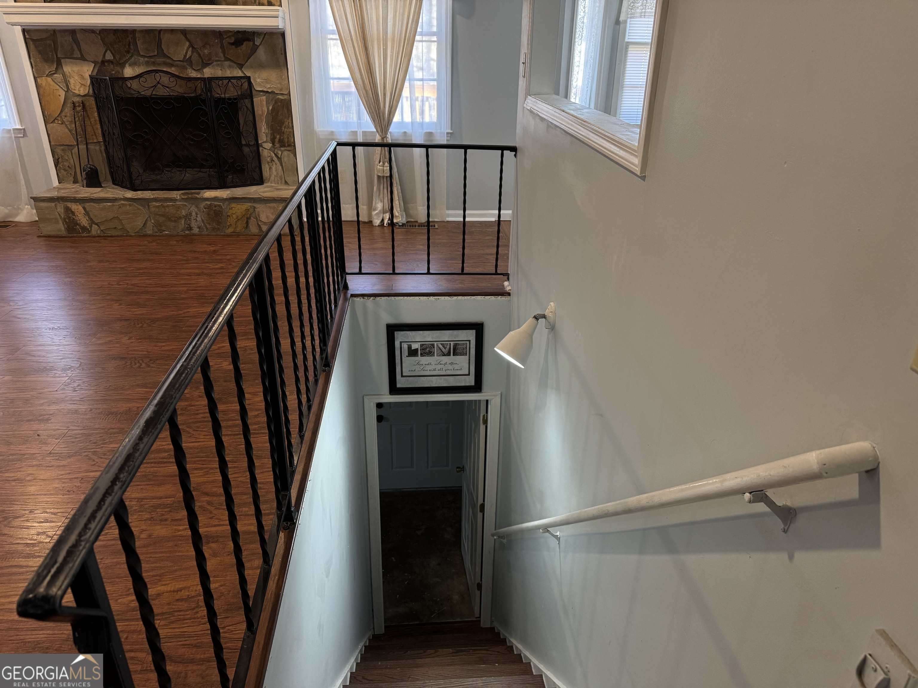 4055 Golfview Drive Villa Rica, GA 30180 - Photo 15 of 28 a view of entryway with wooden floor and stairs