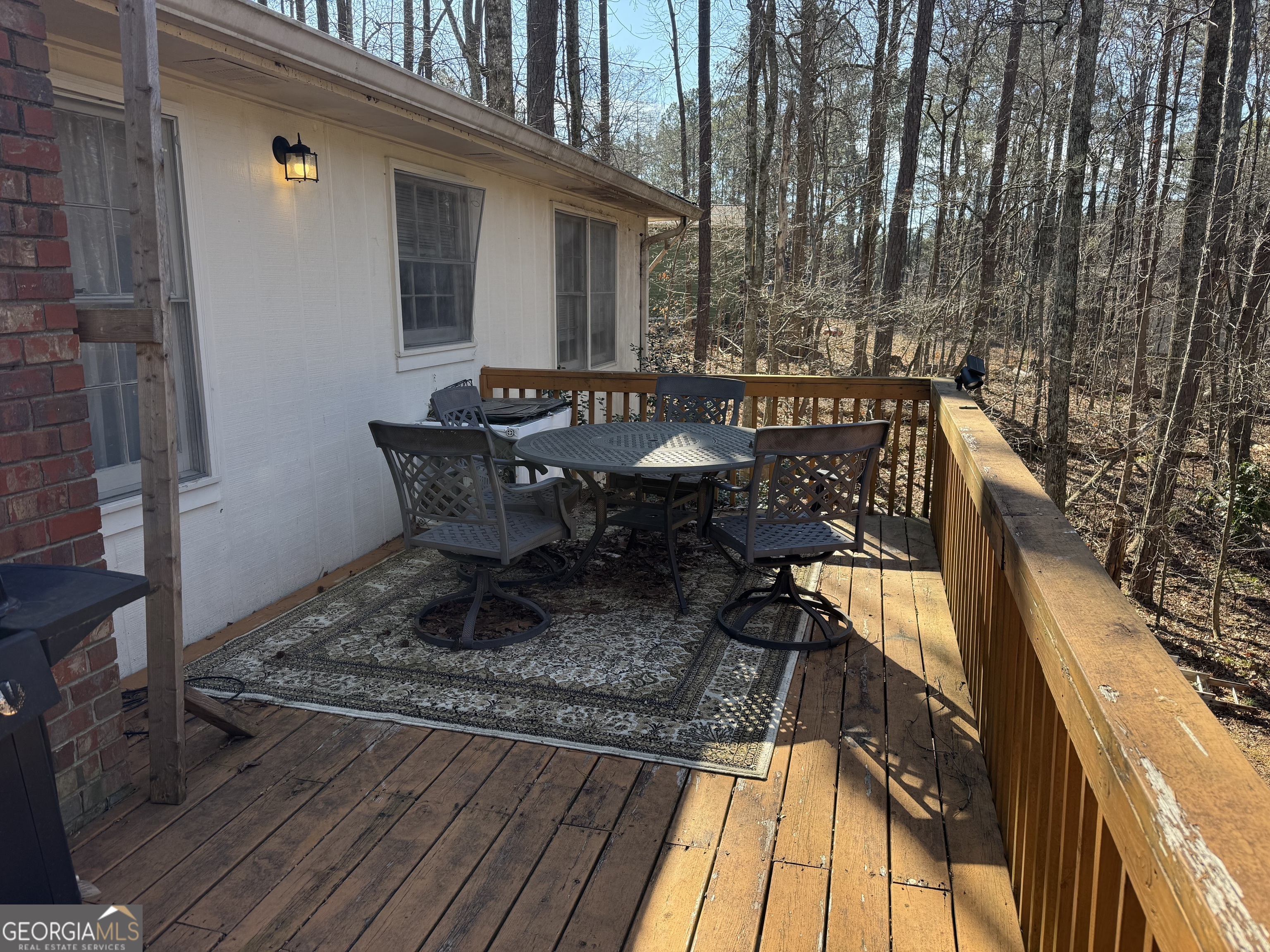 4055 Golfview Drive Villa Rica, GA 30180 - Photo 23 of 28 a view of a house with backyard and sitting area