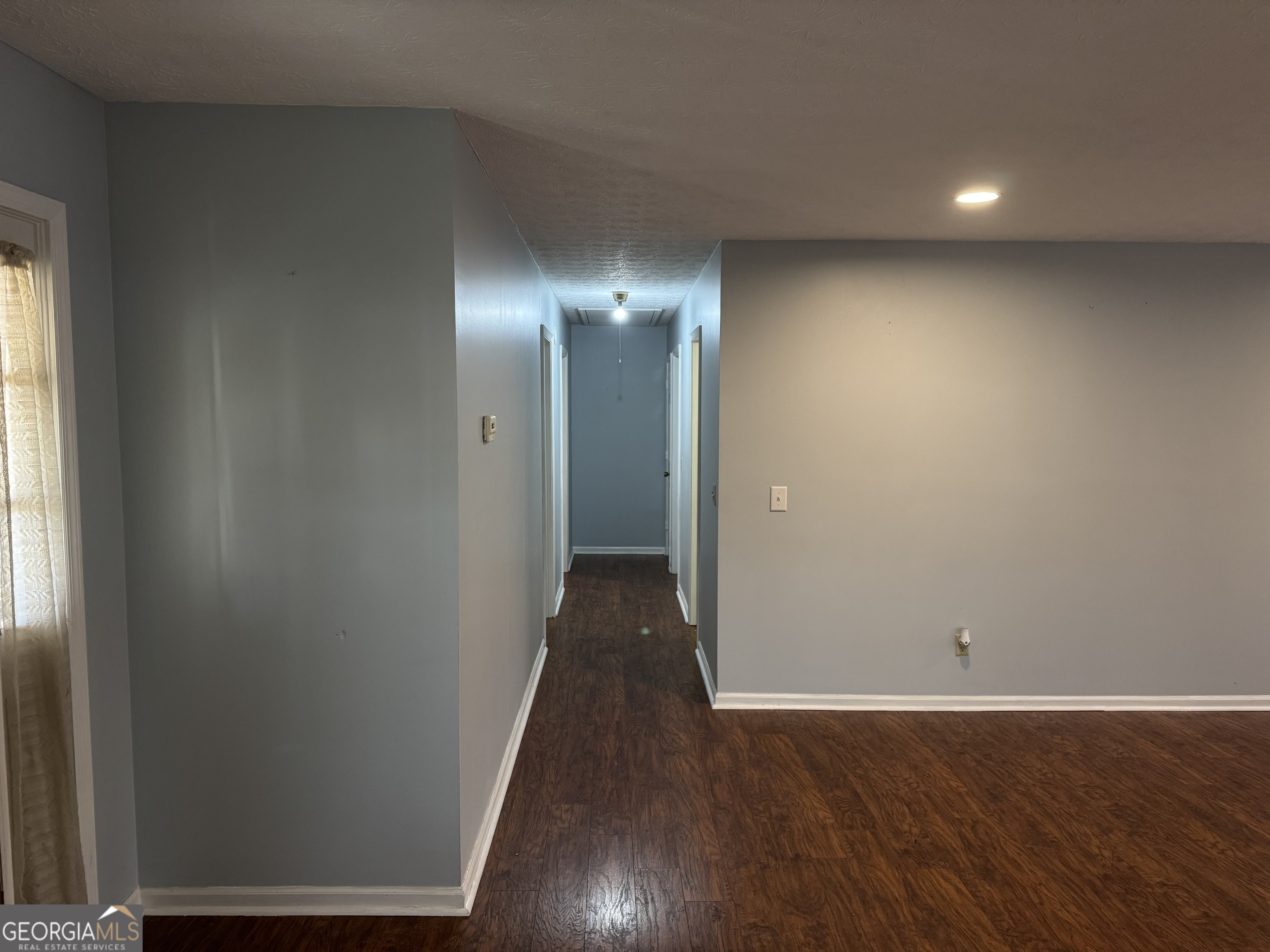 4055 Golfview Drive Villa Rica, GA 30180 - Photo 9 of 28 a view of a livingroom with wooden floor
