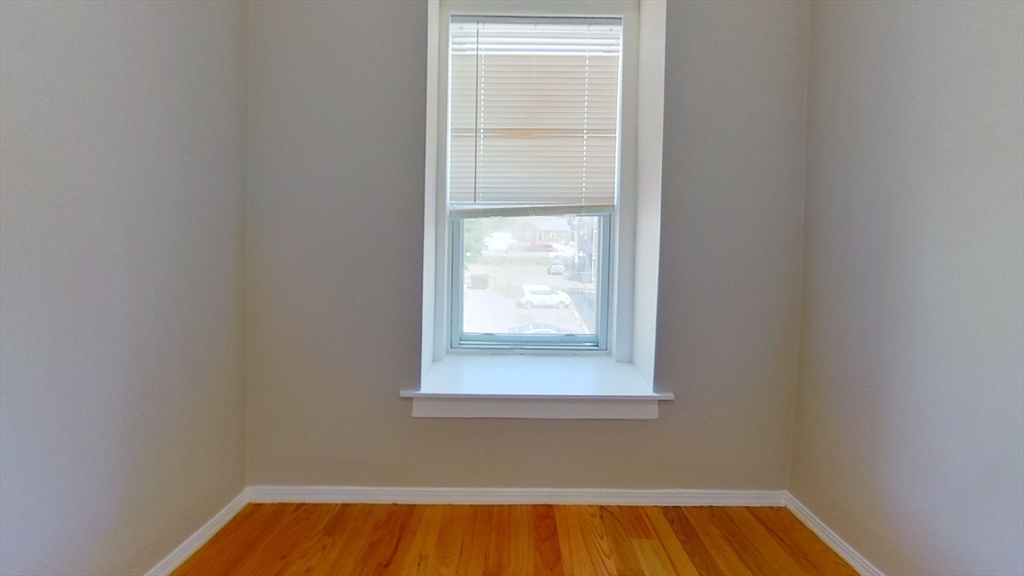 119 George Street, Unit 3 Boston, MA 02119 - Photo 6 of 8 a small space with a window