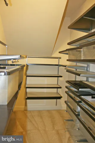 a view of entryway and kitchen