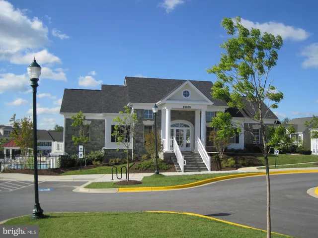 a view of a house with a swimming pool