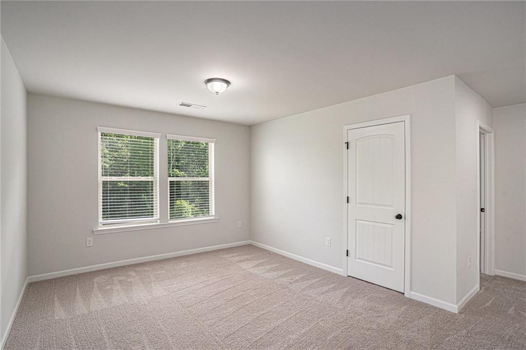 953 Mystic Way Hampton, GA 30228 - Photo 29 of 51 an empty room with a window