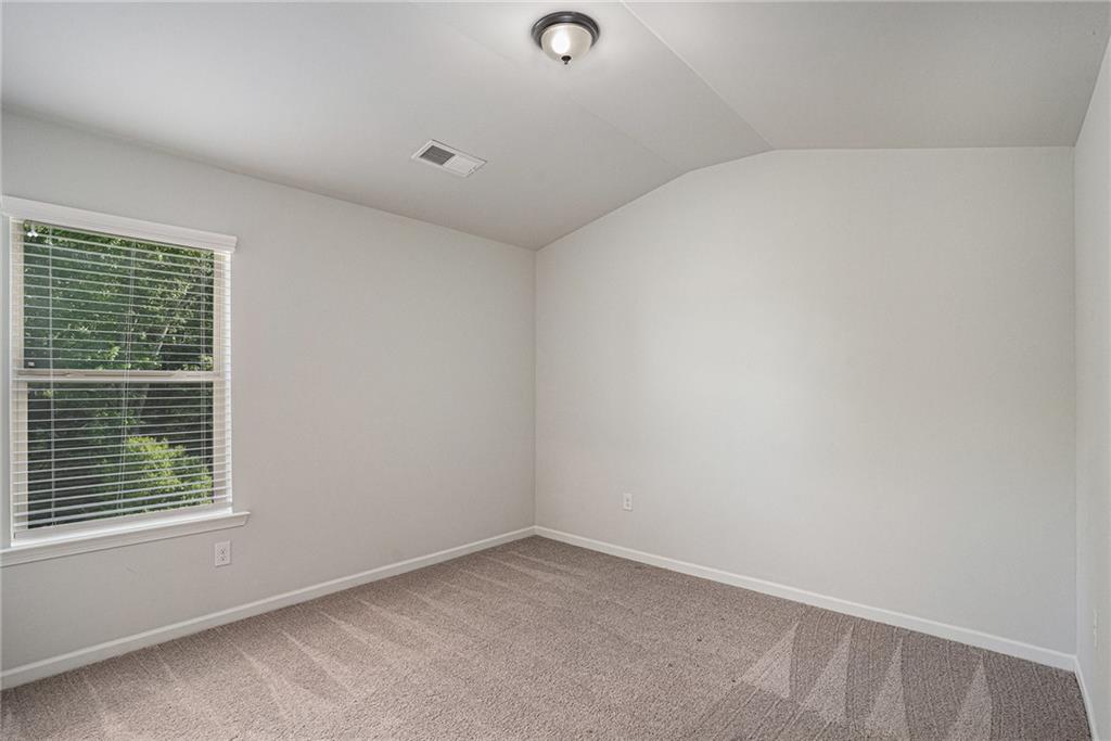 953 Mystic Way Hampton, GA 30228 - Photo 34 of 51 a view of an empty room with a window