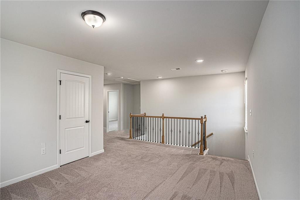 953 Mystic Way Hampton, GA 30228 - Photo 36 of 51 an empty room with windows