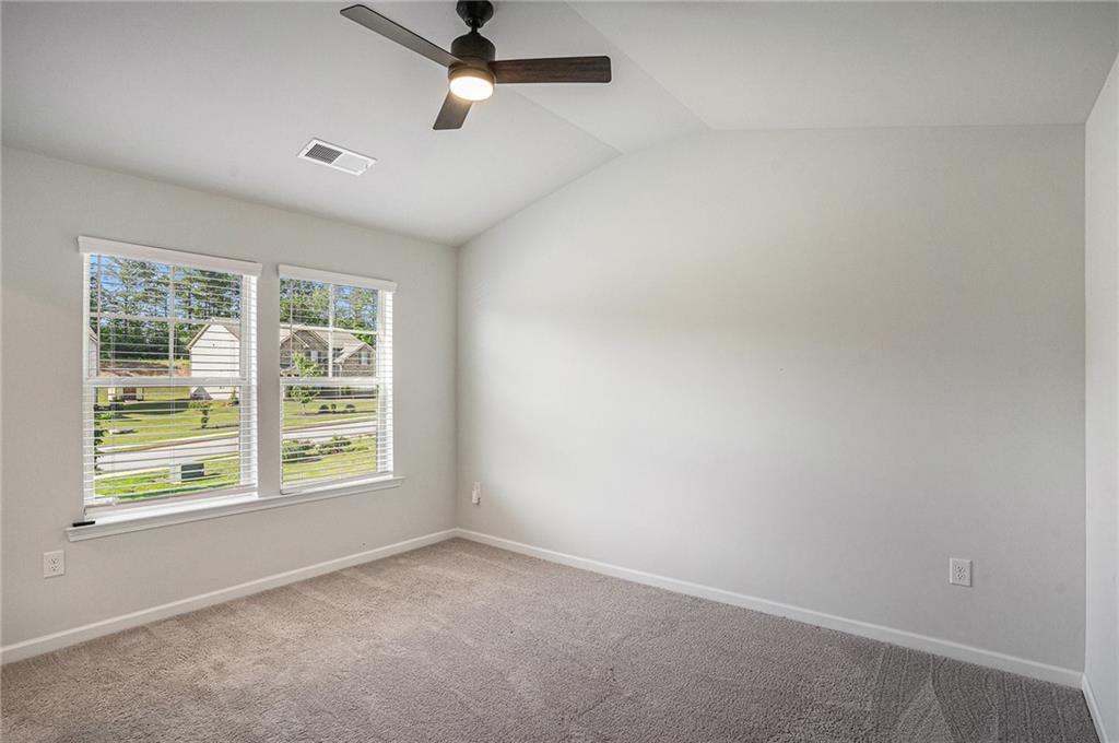 953 Mystic Way Hampton, GA 30228 - Photo 37 of 51 an empty room with a window