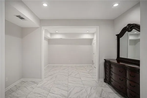 a view of small space with wooden floor
