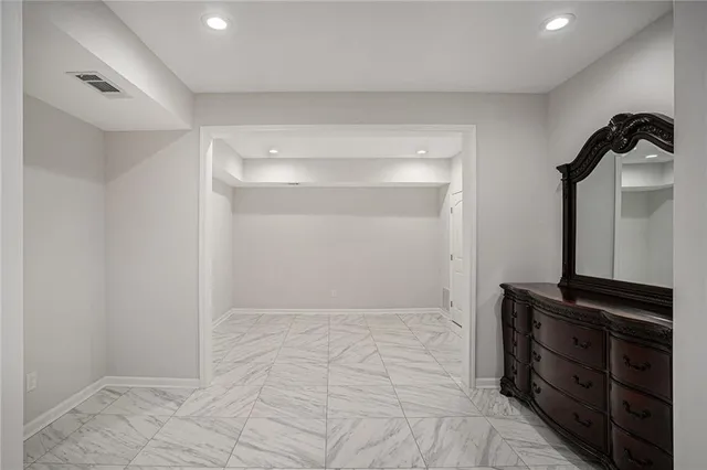 a view of small space with wooden floor