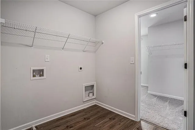 a view of balcony with wooden floor and fence