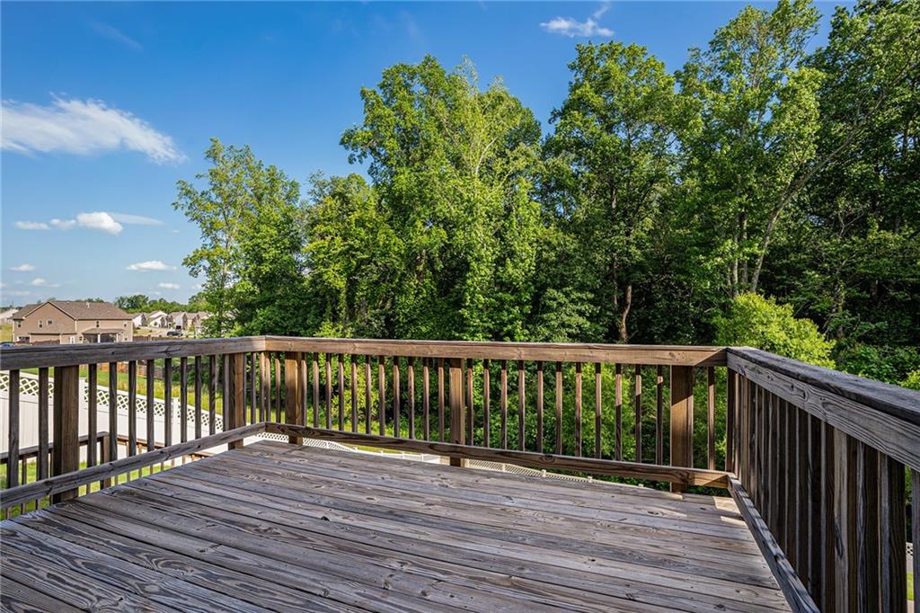 953 Mystic Way Hampton, GA 30228 - Photo 47 of 51 a view of balcony with wooden floor and fence
