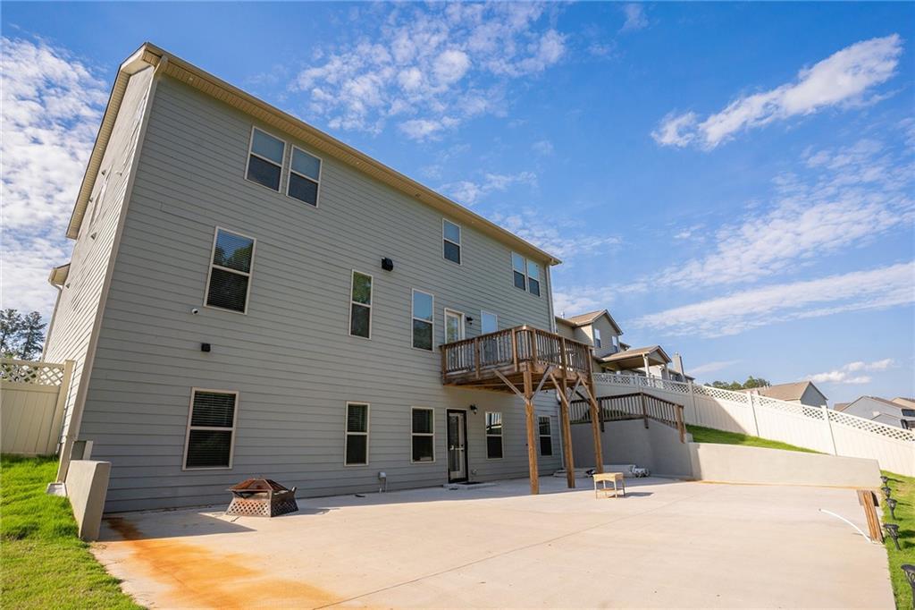 953 Mystic Way Hampton, GA 30228 - Photo 48 of 51 a view of a house with a patio