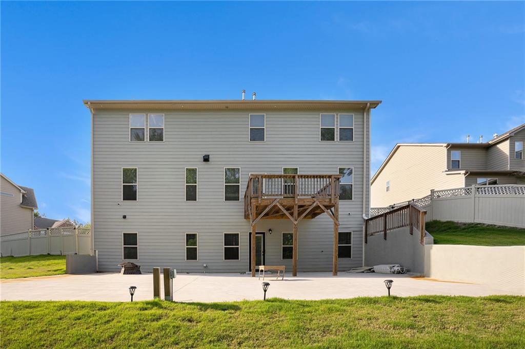 953 Mystic Way Hampton, GA 30228 - Photo 49 of 51 a front view of house with a yard