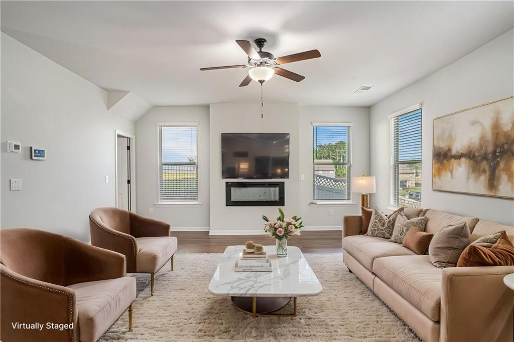 953 Mystic Way Hampton, GA 30228 - Photo 10 of 51 a living room with furniture and a flat screen tv