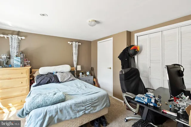 a bedroom with furniture and a bed