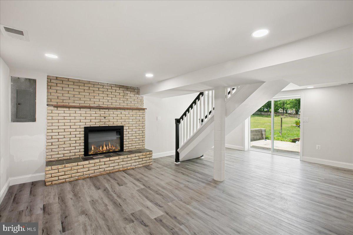 5028 Harpers Ferry Road Sharpsburg, MD 21782 - Photo 22 of 35 Basement Fireplace