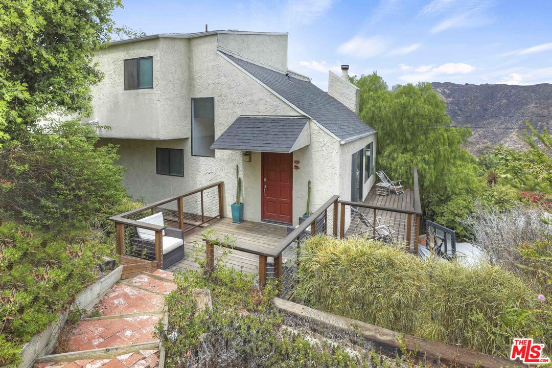 a front view of a house with balcony