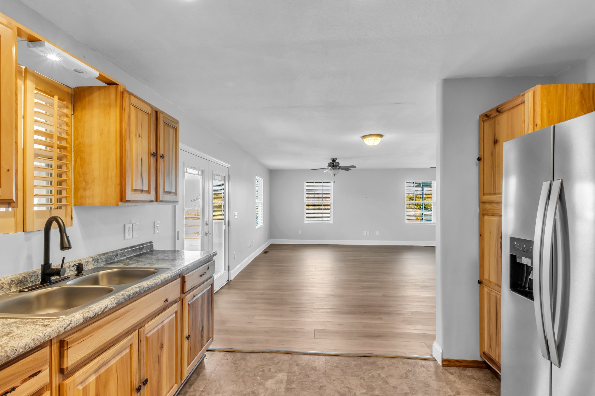 2190 Unionville Deason Road Bell Buckle, TN 37020 - Photo 12 of 34 a kitchen with stainless steel appliances granite countertop a refrigerator a sink and a stove