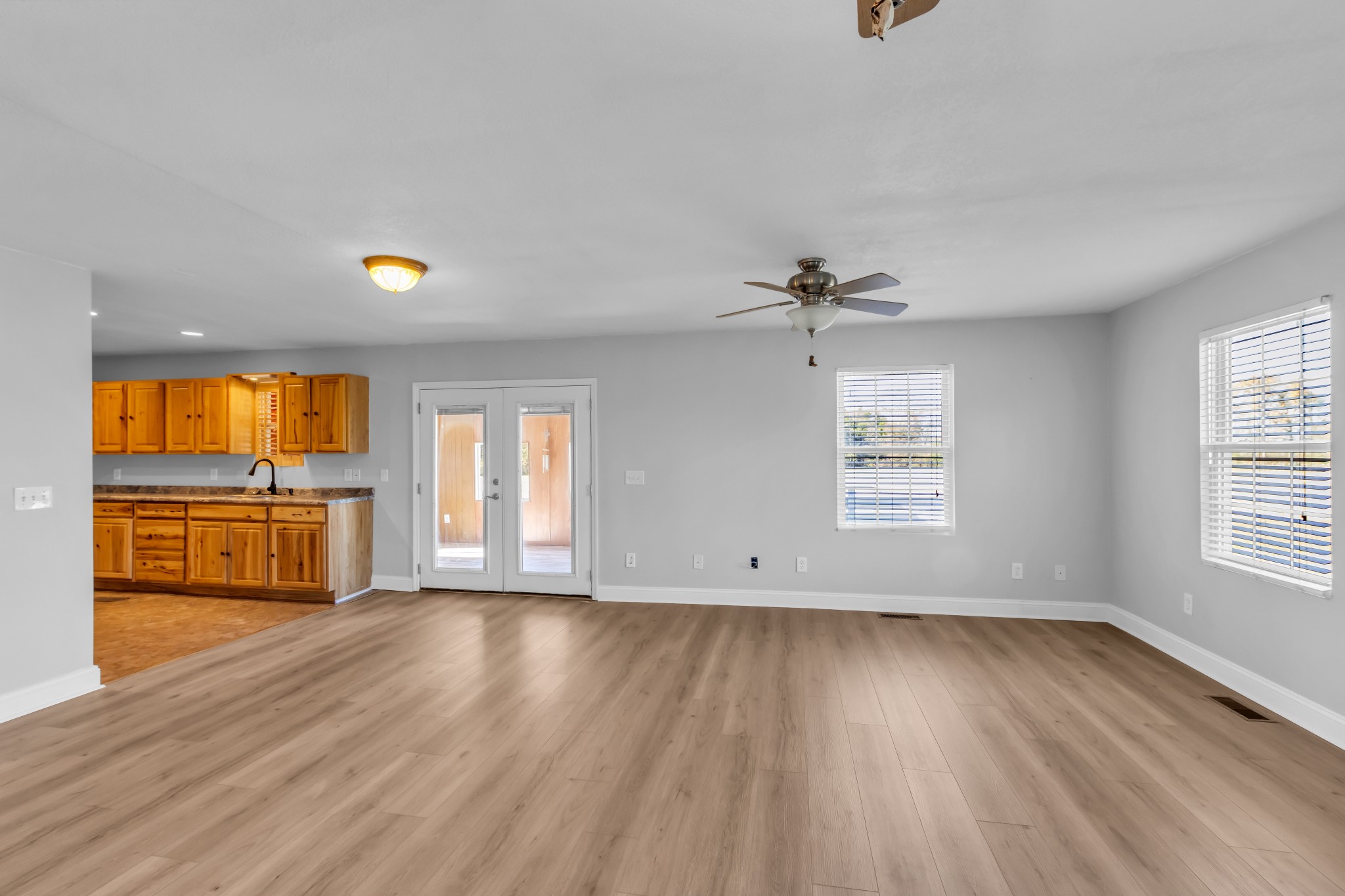 2190 Unionville Deason Road Bell Buckle, TN 37020 - Photo 6 of 34 wooden floor in an empty room with a window