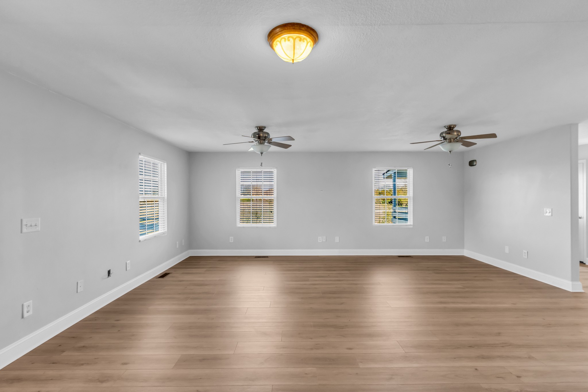 2190 Unionville Deason Road Bell Buckle, TN 37020 - Photo 8 of 34 wooden floor in an empty room with a window