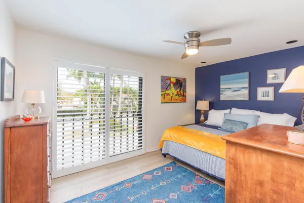 a bed room with a bed and a window