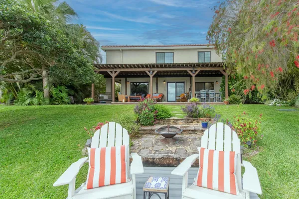 a front view of a house having patio