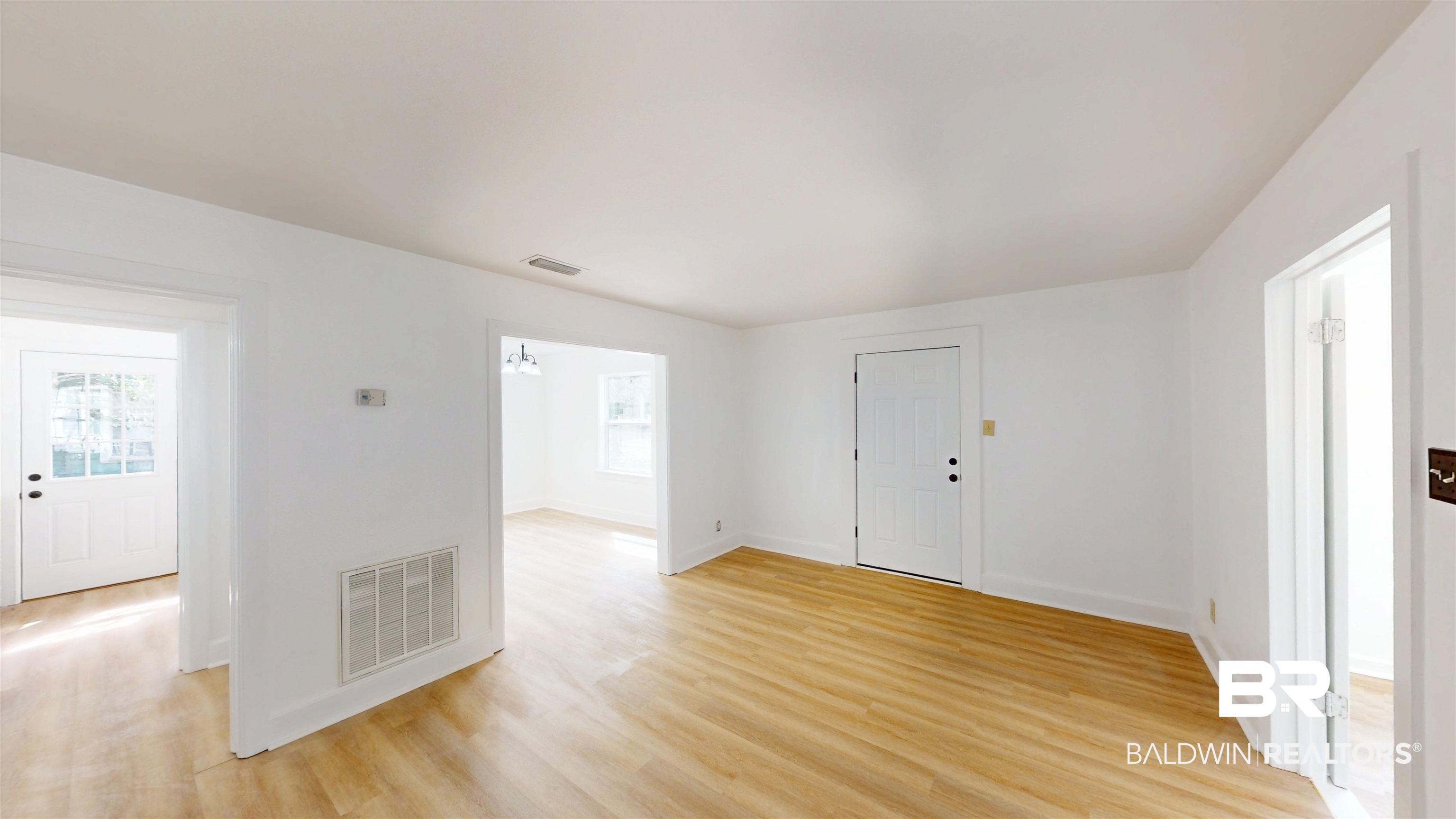 606 Shady Oak Drive Mobile, AL 36608 - Photo 3 of 14 Entryway with light wood-style flooring and baseboards