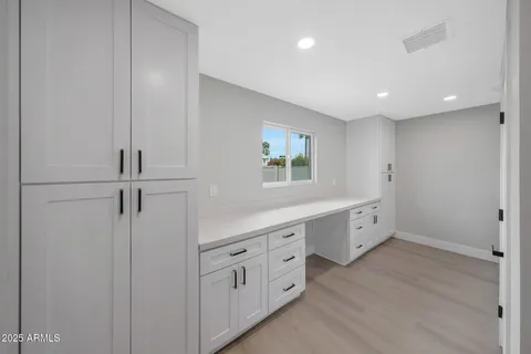 a view of a hallway with closet area