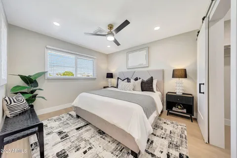 a view of a hallway view with staircase