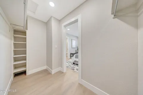 a view of an empty walk in closet