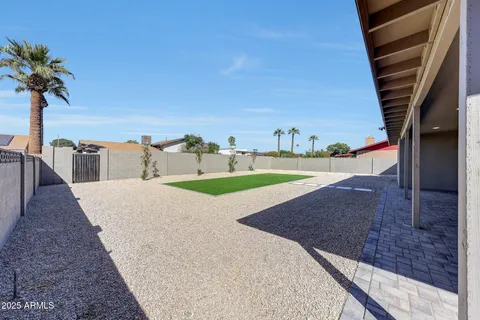 a lobby with furniture and potted plant