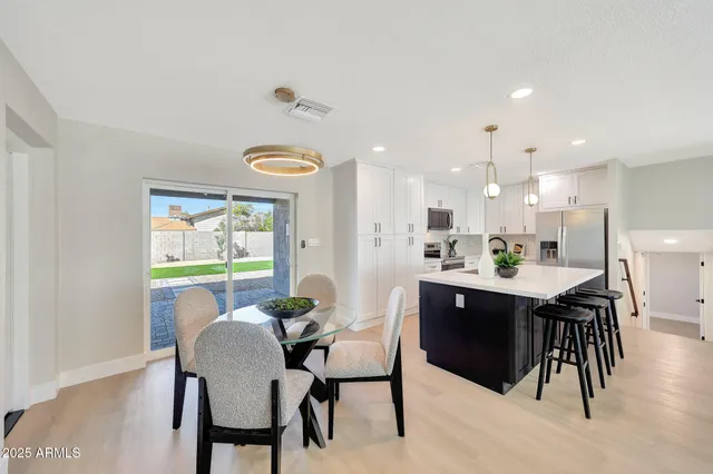 a view of a dining room with furniture