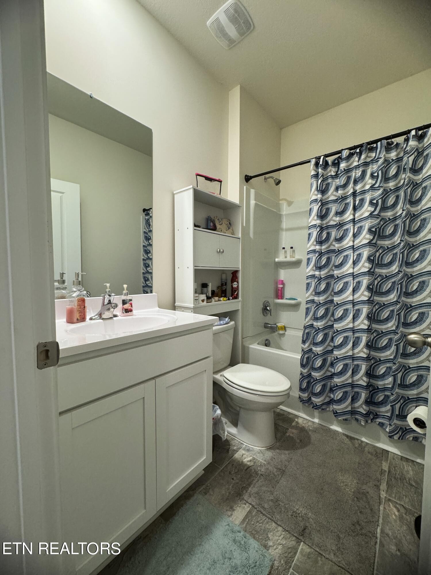 764 North Morelock Road Morristown, TN 37814 - Photo 13 of 18 a bathroom with a sink toilet and shower