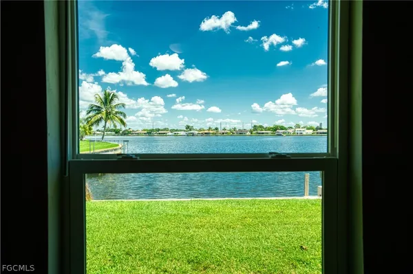 a view of a lake from a yard