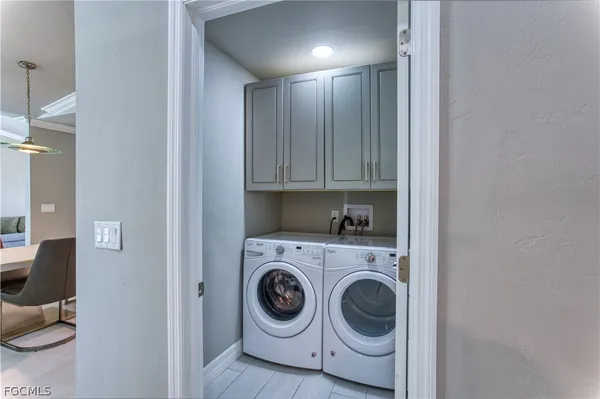 a view of washer and dryer in a utility room