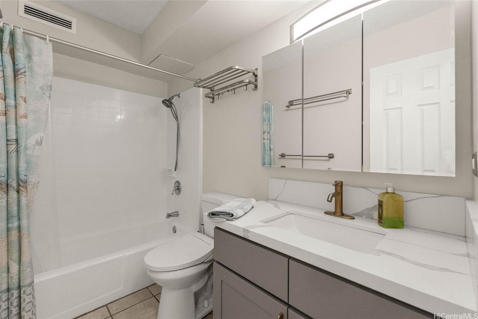 1863 Kaioʻo Drive, Unit 302 Honolulu, HI 96815 - Photo 5 of 10 Fresh reglazed shower and tub area.