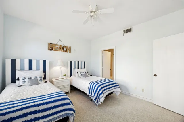 a view of a fountain in front of a house