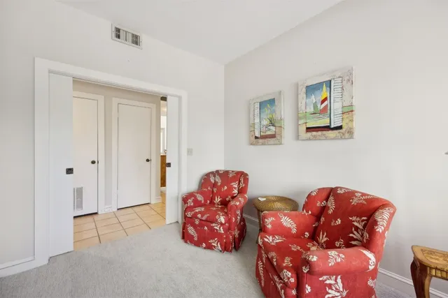 an aerial view of residential building with ocean view