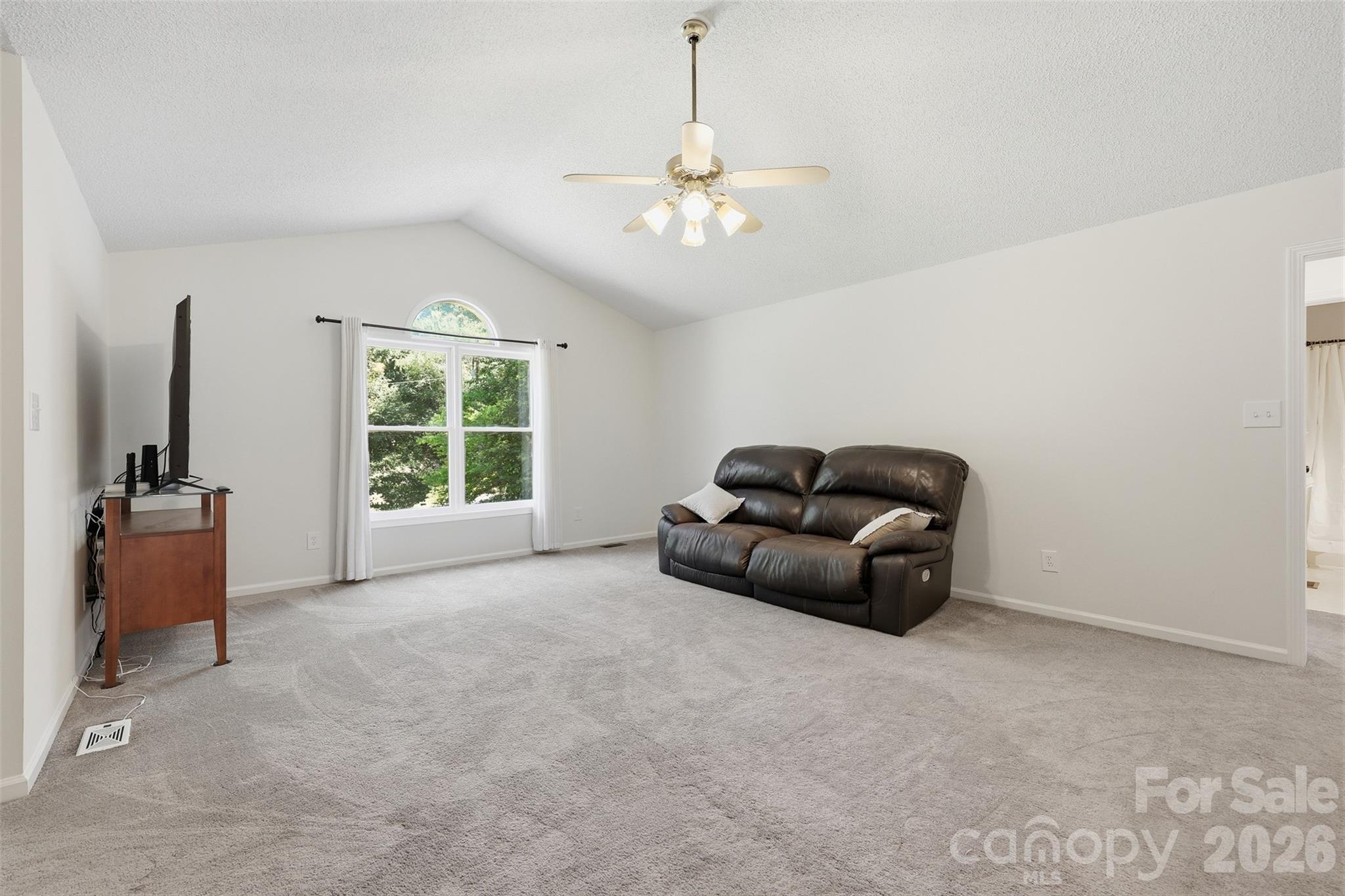 913 Pleasant Ridge Road Fort Mill, SC 29715 - Photo 4 of 40 a living room with furniture and a window
