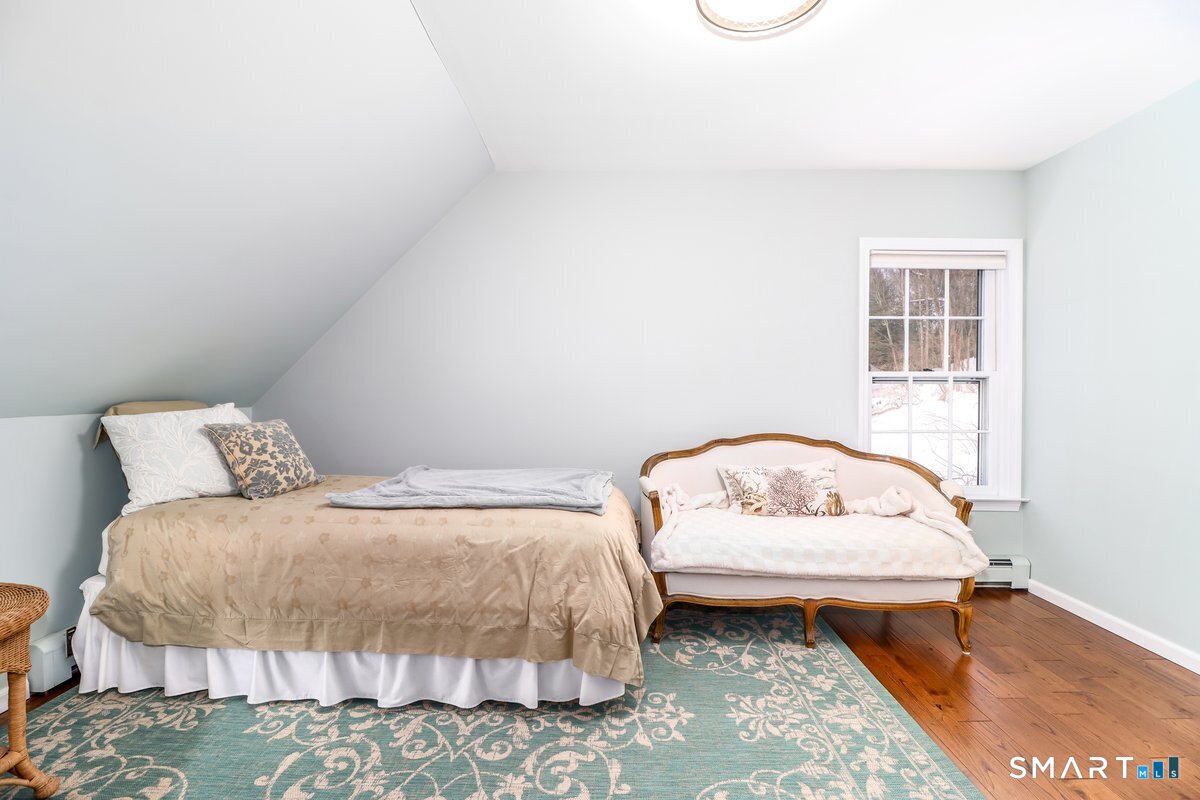 16 A Pole Bridge Road Newtown, CT 06482 - Photo 16 of 27 a bedroom with a bed and a window