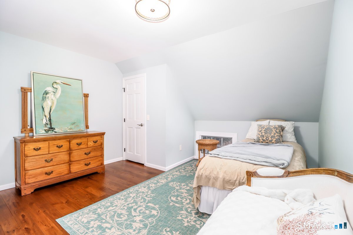 16 A Pole Bridge Road Newtown, CT 06482 - Photo 17 of 27 a bedroom with a bed and a dresser in it